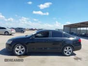 ✅ 2012 Volkswagen Jetta TDI w/Premium & Nav • VIN: 3VWLL7AJ0CM410008 • Lot: 43011566. Listed on IAAI with 207,018 mi. Free auction sales archive from the USA and detailed vehicle history report at DreamBid. Image 14.