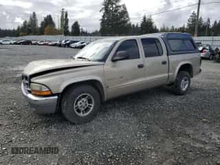 2002 Dodge Dakota SLT с VIN 1B7HL48N02S607590, выставлен на аукционе Copart как лот 78642324 с пробегом 209 081 миль миль и Списание • Salvage title. История ставок и продаж доступна на DreamBid. Изображение 1.