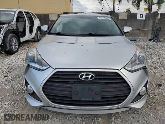 2013 Hyundai Veloster Turbo z VIN KMHTC6AE8DU123217, wystawiony jako Copart lot #69754965 z przebiegiem 11 088 mil mil oraz Czysty tytuł • Clean title. Historia ofert i sprzedaży dostępna na DreamBid. Obrazek 5.