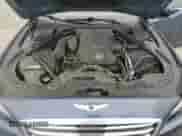 2015 Hyundai Genesis 3.8L z VIN KMHGN4JE8FU077813, wystawiony jako Copart lot #52880775 z przebiegiem 112 354 mil mil oraz Szkoda całkowita • Salvage title. Historia ofert i sprzedaży dostępna na DreamBid. Obrazek 11.