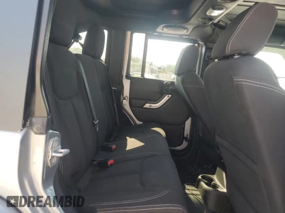 ✅ 2014 Jeep Wrangler Unlimited Sahara • VIN: 1C4BJWEG2EL183003 • Лот: 81305845. Опубликован ранее на Copart с пробегом 132 537 миль. Бесплатный доступ к архиву аукционных продаж из США и подробный отчёт об истории автомобиля на DreamBid. Изображение 11.