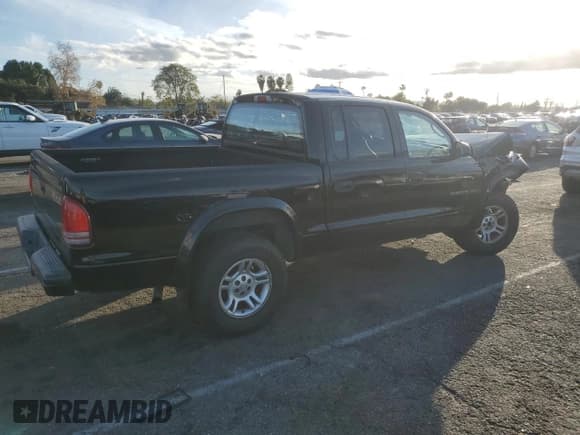 ✅ 2002 Dodge Dakota Sport • VIN: 1B7HG38N82S697439 • Lot: 44282155. Wystawiony na Copart z przebiegiem 239 414 mil. Bezpłatny archiwum sprzedaży aukcyjnych z USA i szczegółowy raport historii pojazdu na DreamBid. Zdjęcie 3.