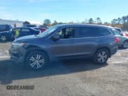 ✅ 2018 Honda Pilot EX-L • VIN: 5FNYF6H57JB028742 • Lot: 43575850. Listed on IAAI with 170,260 mi. Free auction sales archive from the USA and detailed vehicle history report at DreamBid. Image 14.