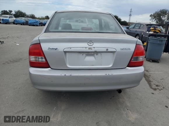 ✅ 2001 Mazda Protege DX • VIN: JM1BJ222310425181 • Lot: 88560255. Wystawiony na Copart z przebiegiem 201 942 mil. Bezpłatny archiwum sprzedaży aukcyjnych z USA i szczegółowy raport historii pojazdu na DreamBid. Zdjęcie 6.