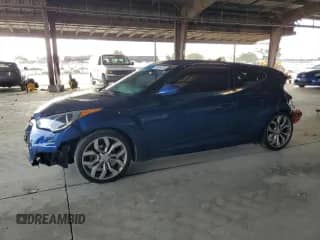2015 Hyundai Veloster z VIN KMHTC6AD3FU241475, wystawiony jako Copart lot #71849575 z przebiegiem Nie podano mil oraz Szkoda całkowita • Salvage title. Historia ofert i sprzedaży dostępna na DreamBid. Obrazek 1.