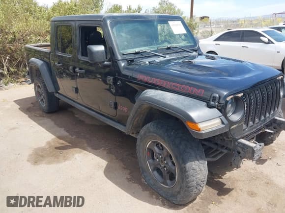 ✅ 2022 Jeep Gladiator Rubicon • VIN: 1C6JJTBM3NL165377 • Lot: 42020584. Listed on IAAI with 87,433 mi. Free auction sales archive from the USA and detailed vehicle history report at DreamBid. Image 1.