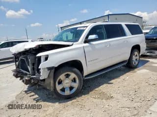 ✅ 2018 Chevrolet Suburban Premier • VIN: 1GNSKJKC7JR355588 • Лот: 68541705. Опубликован ранее на Copart с пробегом 79 666 миль. Бесплатный доступ к архиву аукционных продаж из США и подробный отчёт об истории автомобиля на DreamBid. Изображение 1.