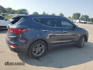 ✅ 2017 Hyundai Santa Fe 2.4L • VIN: 5NMZU3LBXHH009830 • Лот: 69410825. Опубликован ранее на Copart с пробегом 94 847 миль. Бесплатный доступ к архиву аукционных продаж из США и подробный отчёт об истории автомобиля на DreamBid. Изображение 3.