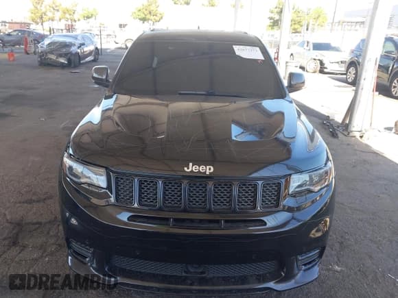 ✅ 2017 Jeep Grand Cherokee SRT • VIN: 1C4RJFDJ6HC654828 • Lot: 42677373. Listed on IAAI with 97,971 mi. Free auction sales archive from the USA and detailed vehicle history report at DreamBid. Image 12.