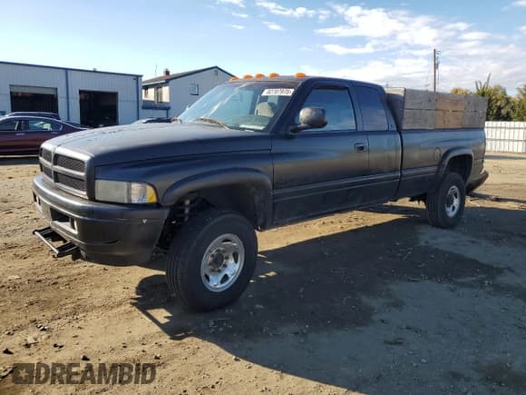 ✅ 2001 Dodge 2500 • VIN: 3B7KF23Z11G168921 • Lot: 82707975. Listed on Copart with 190,231 mi. Free auction sales archive from the USA and detailed vehicle history report at DreamBid. Image 1.