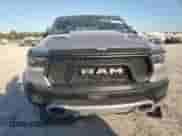 2020 Ram 1500 Rebel с VIN 1C6RRELT7LN299176, выставлен на аукционе Copart как лот 76778334 с пробегом 70 059 миль миль и Списание • Salvage title. История ставок и продаж доступна на DreamBid. Изображение 5.