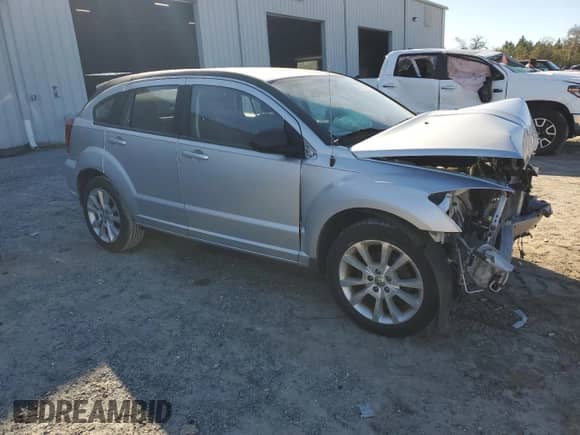 2012 Dodge Caliber SXT Plus with VIN 1C3CDWEA2CD523382, listed as a Copart auction lot 60966505 with Not provided miles and Non repairable. Bid and sale history available at DreamBid. Image 4.