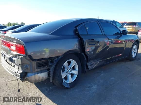 2014 Dodge Charger SE with VIN 2C3CDXBG6EH300282, listed as a IAAI auction lot 43465010 with 76,227 mi miles and . Bid and sale history available at DreamBid. Image 17.