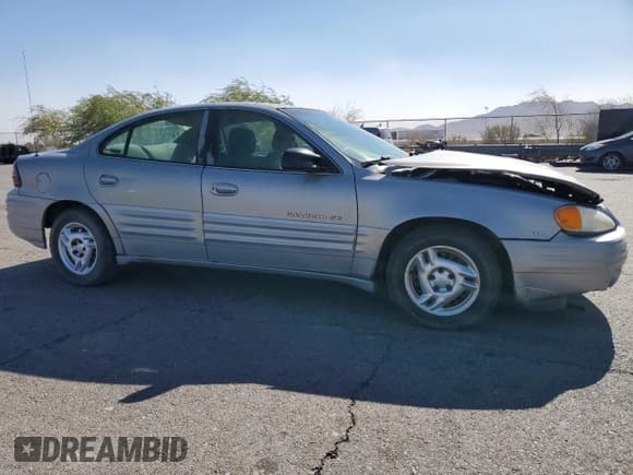 ✅ 1999 Pontiac Grand Am SE2 • VIN: 1G2NE52E5XM826878 • Lot: 77351164. Wystawiony na Copart z przebiegiem 241 463 mil. Bezpłatny archiwum sprzedaży aukcyjnych z USA i szczegółowy raport historii pojazdu na DreamBid. Zdjęcie 4.