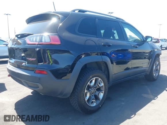 ✅ 2019 Jeep Cherokee Trailhawk • VIN: 1C4PJMBXXKD433284 • Lot: 42020051. Listed on IAAI with 57,089 mi. Free auction sales archive from the USA and detailed vehicle history report at DreamBid. Image 4.