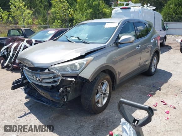 ✅ 2018 Hyundai Santa Fe 2.4L • VIN: 5NMZTDLB4JH107766 • Лот: 43043034. Опубликован ранее на IAAI с пробегом 93 208 миль. Бесплатный доступ к архиву аукционных продаж из США и подробный отчёт об истории автомобиля на DreamBid. Изображение 18.