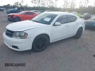 ✅ 2013 Dodge Avenger SXT • VIN: 1C3CDZCG3DN702969 • Lot: 43801638. Listed on IAAI with 198,998 mi. Free auction sales archive from the USA and detailed vehicle history report at DreamBid. Image 2.