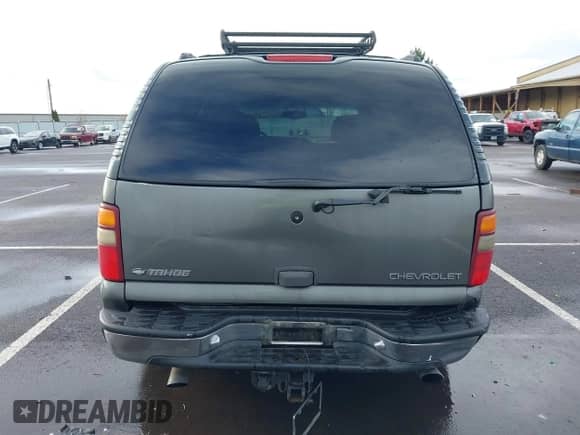 2001 Chevrolet Tahoe LT z VIN 1GNEK13T61R102886, wystawiony jako IAAI lot #41870940 z przebiegiem 267 769 mil mil oraz . Historia ofert i sprzedaży dostępna na DreamBid. Obrazek 17.