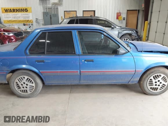 ✅ 1994 Pontiac Sunbird • VIN: 1G2JB54H3R7568960 • Лот: 42928144. Опубликован ранее на IAAI с пробегом 102 846 миль. Бесплатный доступ к архиву аукционных продаж из США и подробный отчёт об истории автомобиля на DreamBid. Изображение 13.