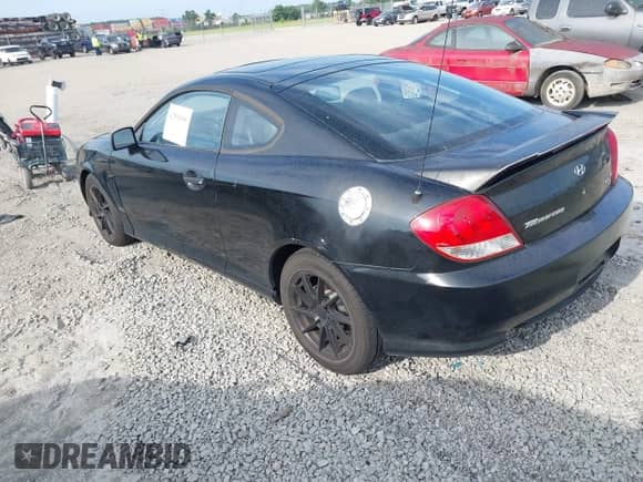 2005 Hyundai Tiburon GT с VIN KMHHN65F45U169356, выставлен на аукционе IAAI как лот 42596896 с пробегом 296 625 миль миль и . История ставок и продаж доступна на DreamBid. Изображение 3.
