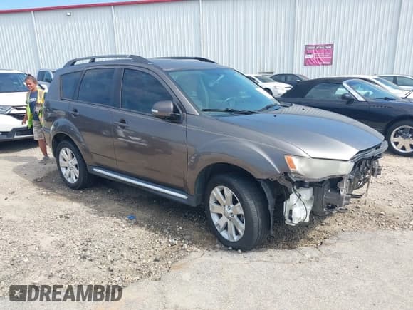 ✅ 2012 Mitsubishi Outlander SE • VIN: JA4AS3AW1CU002897 • Lot: 43079466. Wystawiony na IAAI z przebiegiem 221 765 mil. Bezpłatny archiwum sprzedaży aukcyjnych z USA i szczegółowy raport historii pojazdu na DreamBid. Zdjęcie 1.