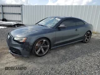 ✅ 2014 Audi RS 5 • VIN: WUAC6AFR2EA900183 • Lot: 64121465. Listed on Copart with 137,944 mi. Free auction sales archive from the USA and detailed vehicle history report at DreamBid. Image 1.