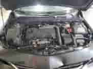 2018 Chevrolet Malibu LT z VIN 1G1ZD5ST7JF256661, wystawiony jako Copart lot #82763835 z przebiegiem 137 099 mil mil oraz Szkoda całkowita • Salvage title. Historia ofert i sprzedaży dostępna na DreamBid. Obrazek 11.