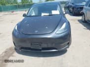 ✅ 2025 Tesla Model Y Long Range • VIN: 7SAYGDEE1SF303533 • Lot: 42584561. Listed on IAAI with 20,983 mi. Free auction sales archive from the USA and detailed vehicle history report at DreamBid. Image 12.