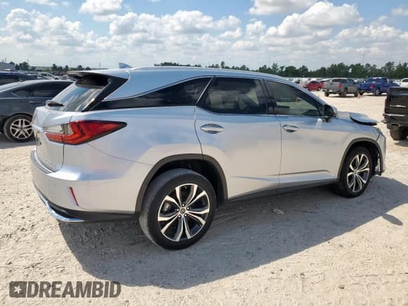 ✅ 2022 Lexus RX 350L • VIN: JTJHZKEA9N2028507 • Lot: 82072945. Wystawiony na Copart z przebiegiem 26 418 mil. Bezpłatny archiwum sprzedaży aukcyjnych z USA i szczegółowy raport historii pojazdu na DreamBid. Zdjęcie 3.