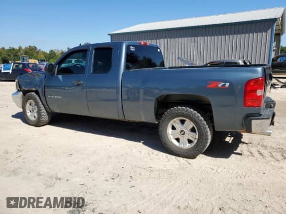 2012 Chevrolet Silverado 1500 LT with VIN 1GCRCSE02CZ148654, listed as a Copart auction lot 86171285 with 218,565 mi miles and Salvage title. Bid and sale history available at DreamBid. Image 2.