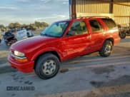 ✅ 2002 Chevrolet Blazer LS • VIN: 1GNDT13W22K205977 • Lot: 94338335. Listed on Copart with 192,024 mi. Free auction sales archive from the USA and detailed vehicle history report at DreamBid. Image 1.
