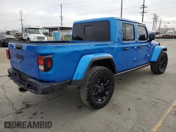 ✅ 2024 Jeep Gladiator Sport S • VIN: 1C6HJTAG2RL126215 • Лот: 91089345. Опубликован ранее на Copart с пробегом 7 909 миль. Бесплатный доступ к архиву аукционных продаж из США и подробный отчёт об истории автомобиля на DreamBid. Изображение 3.