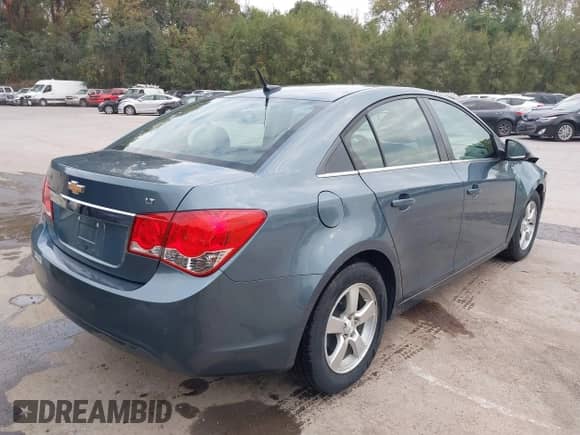 2012 Chevrolet Cruze 1LT z VIN 1G1PF5SC5C7240568, wystawiony jako IAAI lot #43441891 z przebiegiem 100 950 mil mil oraz . Historia ofert i sprzedaży dostępna na DreamBid. Obrazek 4.