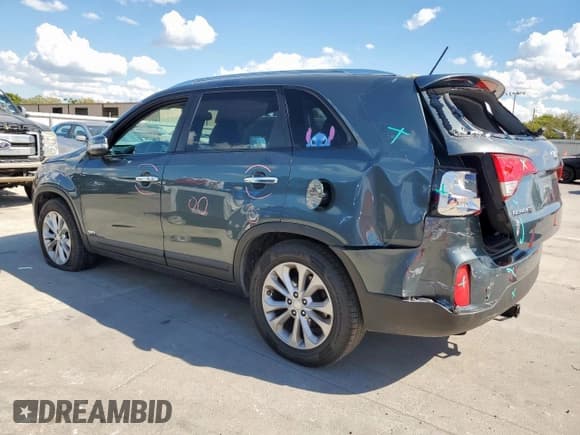 ✅ 2014 Kia Sorento EX • VIN: 5XYKUDA73EG432311 • Lot: 83759635. Listed on Copart with 152,006 mi. Free auction sales archive from the USA and detailed vehicle history report at DreamBid. Image 2.