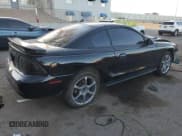 ✅ 1997 Ford Mustang • VIN: 1FALP4048VF141587 • Lot: 49351955. Listed on Copart with 122,756 mi. Free auction sales archive from the USA and detailed vehicle history report at DreamBid. Image 3.