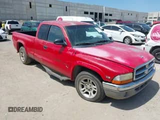 2002 Dodge Dakota Sport z VIN 1B7GL32X12S658855, wystawiony jako IAAI lot #42680702 z przebiegiem 133 507 mil mil oraz . Historia ofert i sprzedaży dostępna na DreamBid. Obrazek 1.