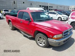 ✅ 2002 Dodge Dakota Sport • VIN: 1B7GL32X12S658855 • Lot: 42680702. Wystawiony na IAAI z przebiegiem 133 507 mil. Bezpłatny archiwum sprzedaży aukcyjnych z USA i szczegółowy raport historii pojazdu na DreamBid. Zdjęcie 1.