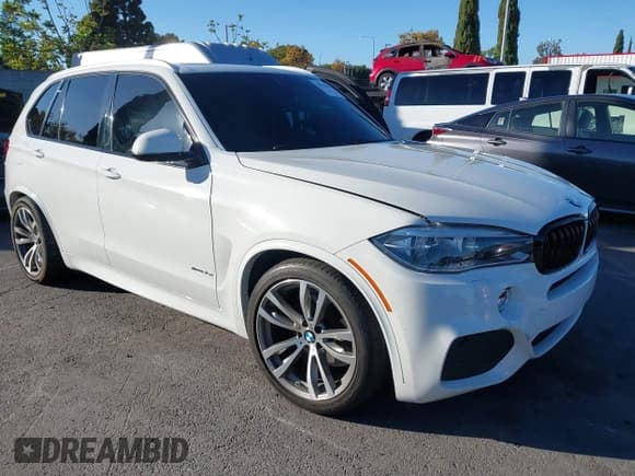 ✅ 2014 BMW X5 xDrive35i • VIN: 5UXKR0C53E0H21184 • Lot: 43520480. Listed on IAAI with 75,808 mi. Free auction sales archive from the USA and detailed vehicle history report at DreamBid. Image 1.