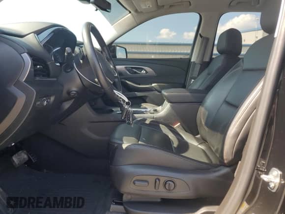 2021 Chevrolet Traverse Premier с VIN 1GNERKKWXMJ269994, выставлен на аукционе Copart как лот 67853835 с пробегом 66 056 миль миль и Списание • Salvage title. История ставок и продаж доступна на DreamBid. Изображение 7.