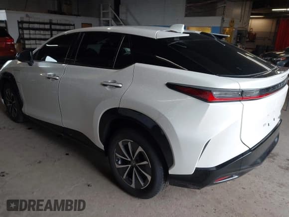 ✅ 2024 Lexus RZ 450e Premium • VIN: JTJAAAAB8RA023733 • Lot: 42319612. Listed on IAAI with 13,907 mi. Free auction sales archive from the USA and detailed vehicle history report at DreamBid. Image 3.