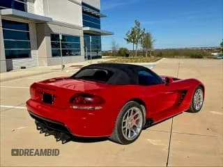 ✅ 2004 Dodge Viper SRT-10 • VIN: 1B3JZ65Z74V100319 • Lot: 94958805. Listed on Copart with 54,469 mi. Free auction sales archive from the USA and detailed vehicle history report at DreamBid. Image 4.