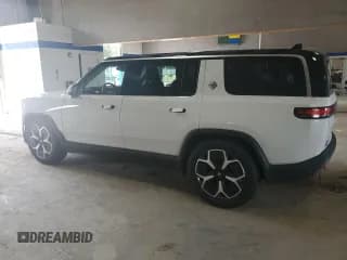 ✅ 2023 Rivian R1S Adventure • VIN: 7PDSGABAXPN021962 • Lot: 66184454. Wystawiony na Copart z przebiegiem Nie podano. Bezpłatny archiwum sprzedaży aukcyjnych z USA i szczegółowy raport historii pojazdu na DreamBid. Zdjęcie 2.