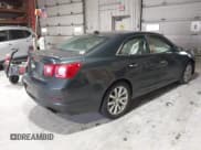 ✅ 2014 Chevrolet Malibu LTZ • VIN: 1G11H5SL7EF132977 • Lot: 43489929. Listed on IAAI with 144,561 mi. Free auction sales archive from the USA and detailed vehicle history report at DreamBid. Image 4.