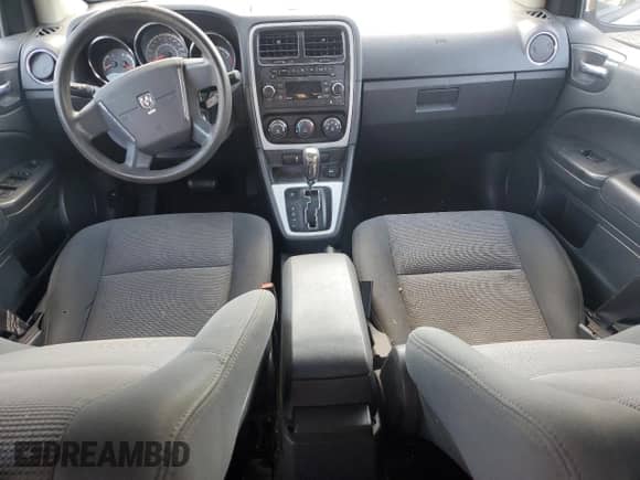 2011 Dodge Caliber Mainstreet with VIN 1B3CB3HA3BD123701, listed as a Copart auction lot 90858485 with 172,631 mi miles and Salvage title. Bid and sale history available at DreamBid. Image 8.