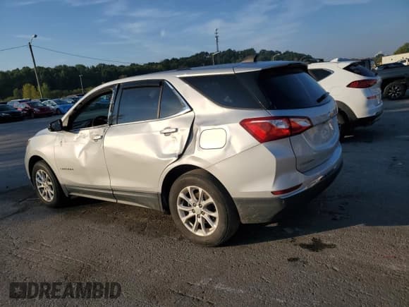 ✅ 2018 Chevrolet Equinox LT • VIN: 2GNAXJEV5J6186810 • Лот: 80959775. Опубликован ранее на Copart с пробегом 55 631 миль. Бесплатный доступ к архиву аукционных продаж из США и подробный отчёт об истории автомобиля на DreamBid. Изображение 2.