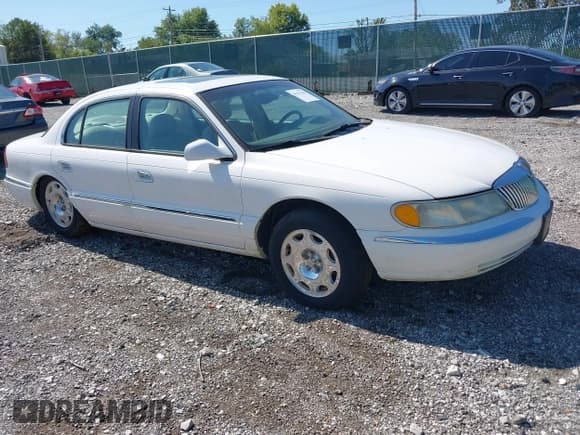 ✅ 2002 Lincoln Continental • VIN: 1LNHM97V52Y600008 • Лот: 43153434. Опубликован ранее на IAAI с пробегом 76 040 миль. Бесплатный доступ к архиву аукционных продаж из США и подробный отчёт об истории автомобиля на DreamBid. Изображение 1.