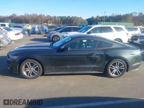 ✅ 2015 Ford Mustang EcoBoost • VIN: 1FA6P8TH3F5348589 • Лот: 43591745. Опубликован ранее на IAAI с пробегом 136 388 миль. Бесплатный доступ к архиву аукционных продаж из США и подробный отчёт об истории автомобиля на DreamBid. Изображение 14.