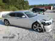 2006 Dodge Charger SRT-8 с VIN 2B3KA73W36H386207, выставлен на аукционе Copart как лот 75006284 с пробегом 241 997 миль миль и Списание • Salvage title. История ставок и продаж доступна на DreamBid. Изображение 4.