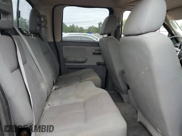 2005 Dodge Dakota ST z VIN 1D7HE28KX5S304735, wystawiony jako Copart lot #81015315 z przebiegiem 199 842 mil mil oraz Szkoda całkowita • Salvage title. Historia ofert i sprzedaży dostępna na DreamBid. Obrazek 10.