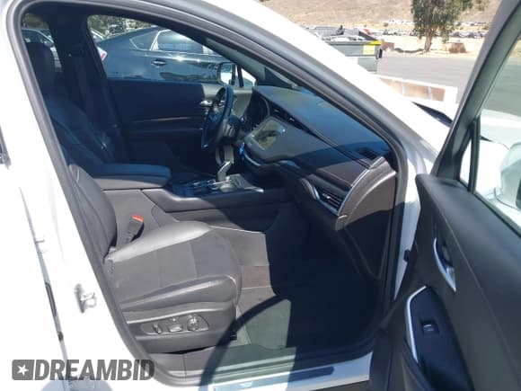 ✅ 2023 Cadillac XT4 AWD Sport • VIN: 1GYFZFR49PF104559 • Лот: 43378275. Опубликован ранее на IAAI с пробегом 26 589 миль. Бесплатный доступ к архиву аукционных продаж из США и подробный отчёт об истории автомобиля на DreamBid. Изображение 5.